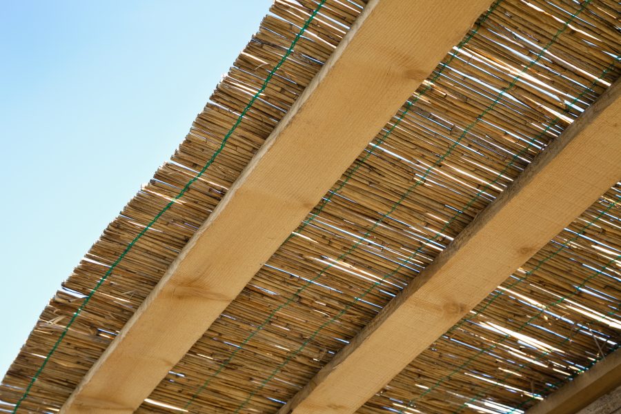 Close up of traditional reed and wooden roof