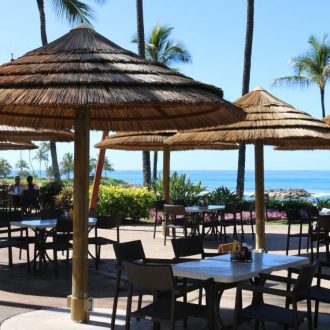 viro reed umbrellas around an outdoor seating area